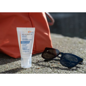 Ducray Melascreen Protective Fluid Слънцезащитен флуид за лице против пигментация SPF50, 50ml