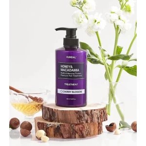 Kundal Honey & Macadamia Natural Conditioner Cherry Blossom Балсам за възстановяване на увредена коса, 500ml